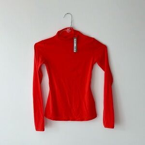 SKIMS | Fits Everybody Turtleneck Top in Poppy - S